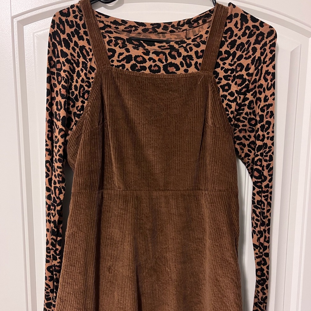 Cheetah long sleeve shirt paired with brown overall dress